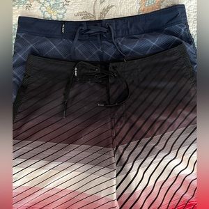 Two pairs of RS Surf Board Shorts